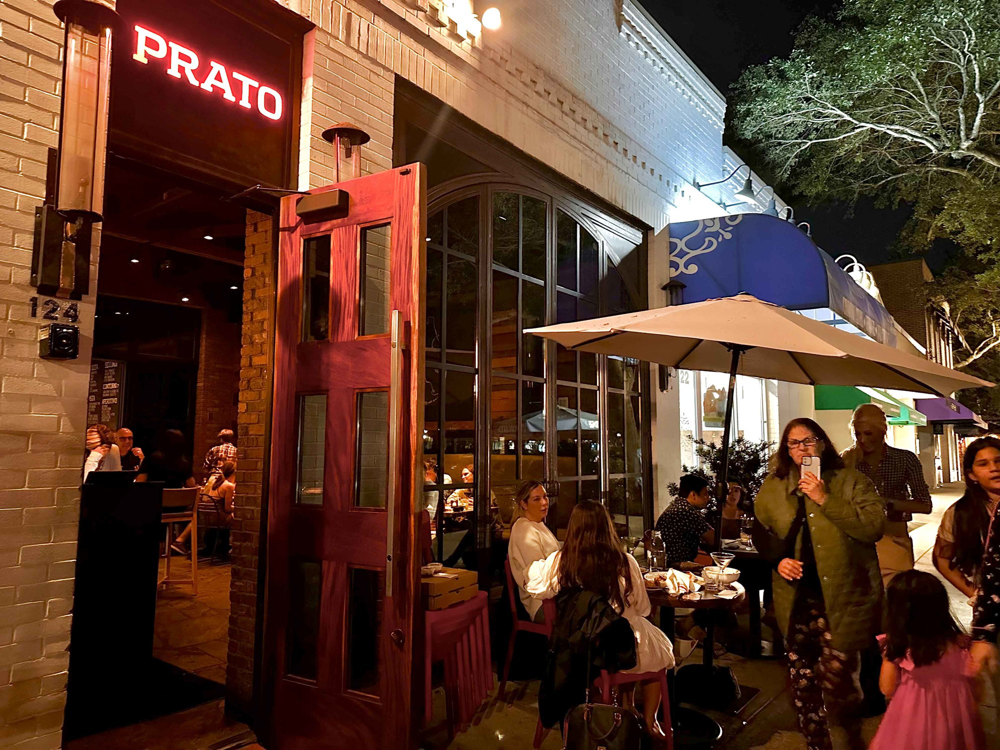 Outdoor nighttime dining at Prato
